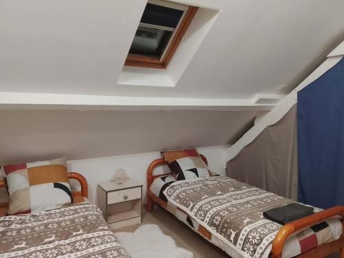 Ένα ή περισσότερα κρεβάτια σε δωμάτιο στο Grand Duplex, proche de la Dordogne