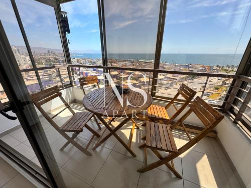 En balkon eller terrasse på NORTH SUITE - Departamento con Vista al Mar- Parking y Piscina-Cercano a Mall la Portada
