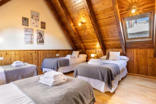 Кровать или кровати в номере Casa val de Unhola