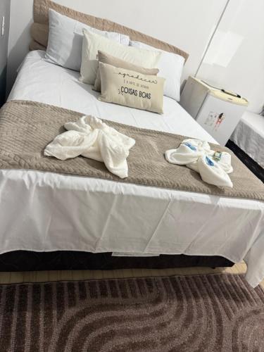 En eller flere senge i et værelse på Pousada Canto das Lagoas