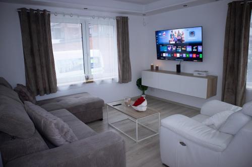 Μια τηλεόραση ή/και κέντρο ψυχαγωγίας στο Villa aux portes de Bruxelles