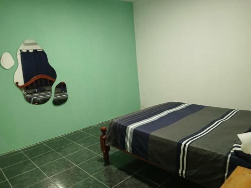 Ένα ή περισσότερα κρεβάτια σε δωμάτιο στο Amplio departamento zona céntrica