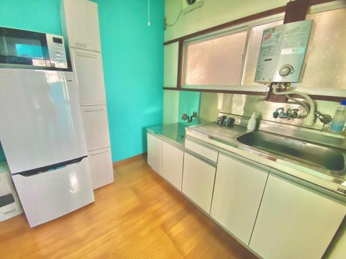 Køkken eller tekøkken på KAMEYA HOUSE ENOSHIMA - Vacation STAY 01325v