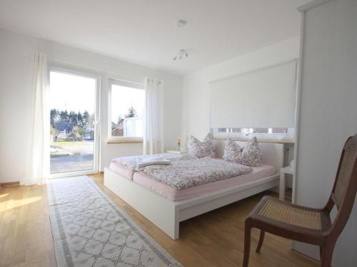 Postel nebo postele na pokoji v ubytování Biebernest Comfortable holiday residence