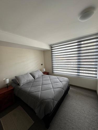 En eller flere senge i et værelse på Aires Norte 33 - Viña del Mar