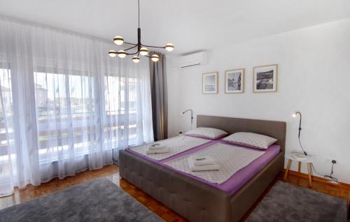 Apartments with parking space Umag - 22680