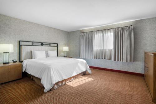 a large bedroom with a large bed and a window at SureStay Hotel by Best Western Camarillo in Camarillo