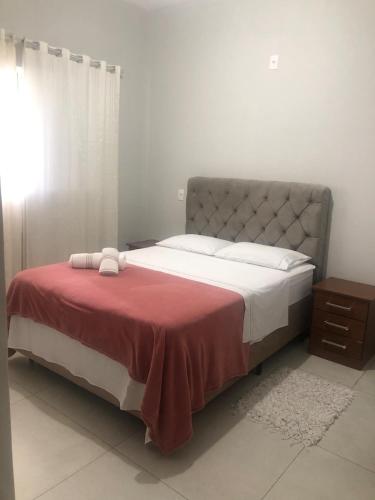 Кровать или кровати в номере Apto 3 quartos 5 do centro