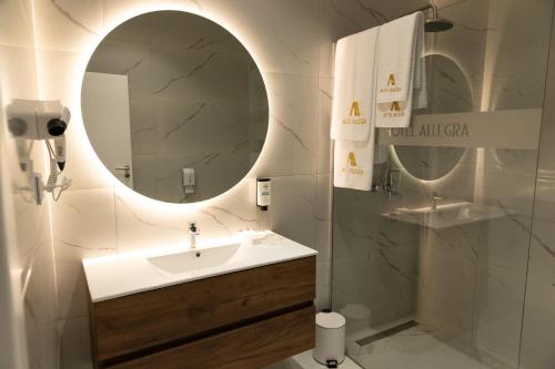 Un baño de Hotel Allegra
