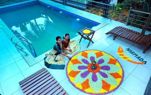 Bazén v ubytování NARMADA HOMESTAY Yamuna nebo v jeho okolí