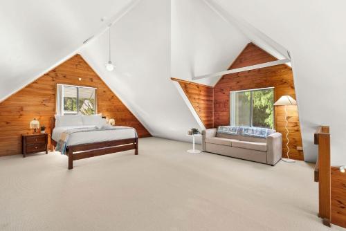 Ένα ή περισσότερα κρεβάτια σε δωμάτιο στο Cottage on Boambee