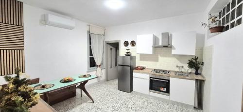 Η κουζίνα ή μικρή κουζίνα στο Villa Due Cieli 2