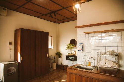Η κουζίνα ή μικρή κουζίνα στο Homestay Hồng Phúc