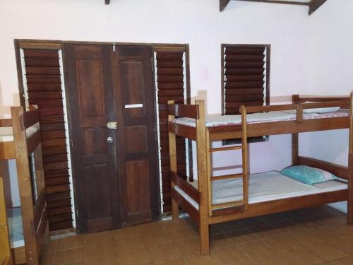 Postel nebo postele na pokoji v ubytování Bluepango Guest House