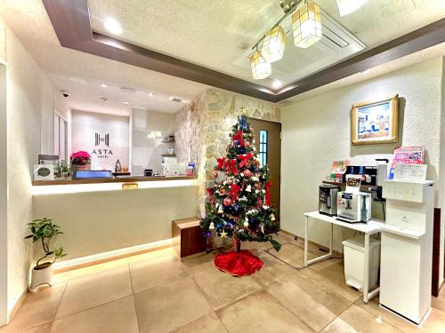 Příslušenství pro přípravu čaje a kávy v ubytování Asta Hotel