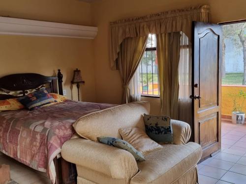 Ένα ή περισσότερα κρεβάτια σε δωμάτιο στο Casa San Lázaro