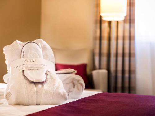 Ένα ή περισσότερα κρεβάτια σε δωμάτιο στο Mercure Hotel Frankfurt Eschborn Ost