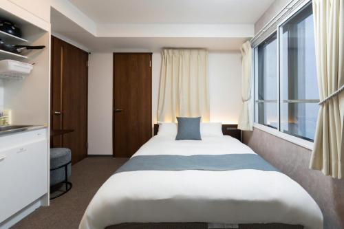 Giường trong phòng chung tại LudiCent717 - Vacation STAY 08147v