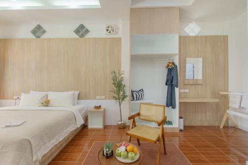 Una cama o camas en una habitación de Three CoCo Villa AoNang Beach