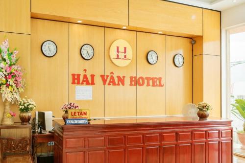 a waiting room with clocks on the wall at Hải Vân Hotel Điện Biên in Diện Biên Phủ