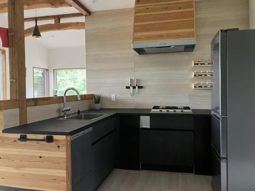 Η κουζίνα ή μικρή κουζίνα στο Chalet Tsugaike