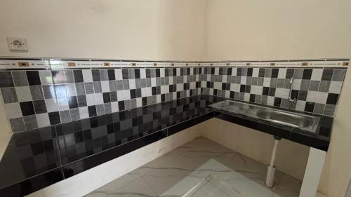 Et badeværelse på Homestay Permana Syariah