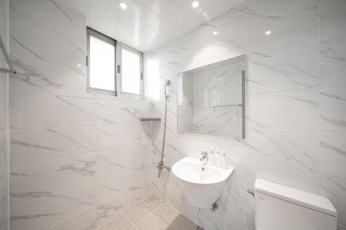 Koupelna v ubytování Elegance hotel hwangridan