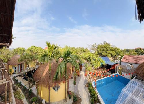 an overhead view of a resort with a swimming pool at Tam Coc Sora - Traditional Home - Center in Vũ Lâm