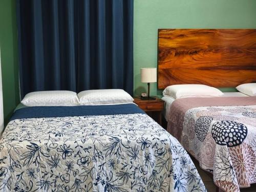 Uma cama ou camas num quarto em Casa ola Rinconada Piscina Starlink 5 min caminando a bahía Carrizalillo