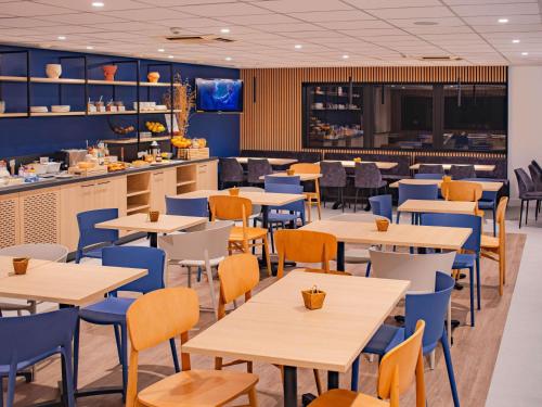 Un restaurante o sitio para comer en ibis Rennes Beaulieu