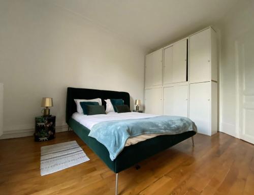 En eller flere senge i et værelse på Au coeur de l'Ile Saint Louis