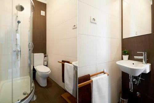 y baño con aseo, lavabo y ducha. en Em frente à Praia e Marina, en Vila do Conde