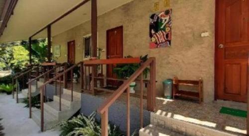 Balkón nebo terasa v ubytování HotelBanAunirukChiangrai