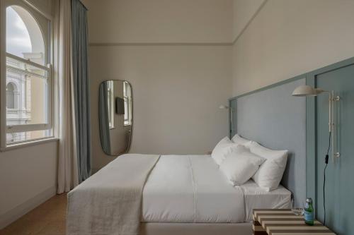 Postel nebo postele na pokoji v ubytování Owston Hotel