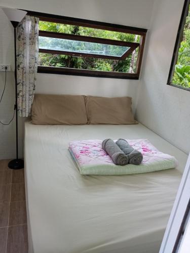 En eller flere senge i et værelse på My home Koh kood2 Jungle of Smiles