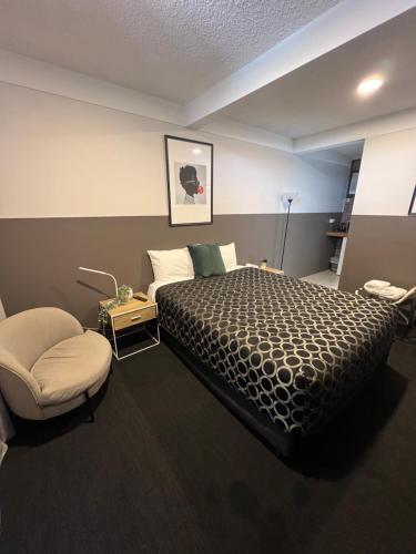 Postel nebo postele na pokoji v ubytování Cessnock Vintage motor inn