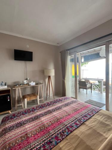 Μια τηλεόραση ή/και κέντρο ψυχαγωγίας στο VnS Beachfront Guesthouse