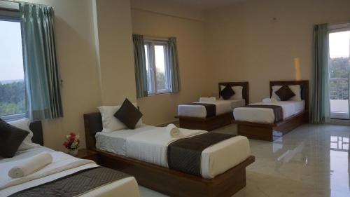 Postel nebo postele na pokoji v ubytování D D Luxury Inn