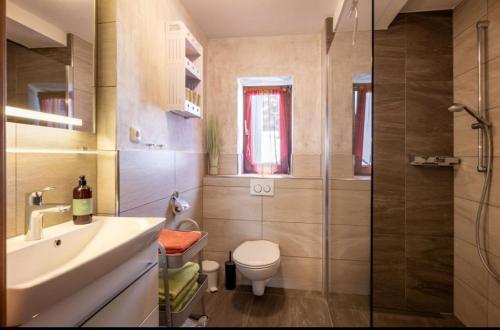 Ванная комната в Ferienwohnung Haus Germania