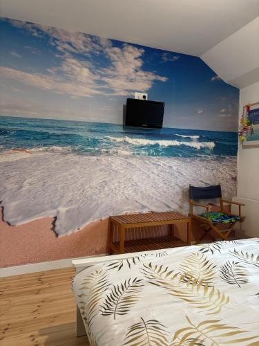 Llit o llits en una habitació de Le Cocon Familial