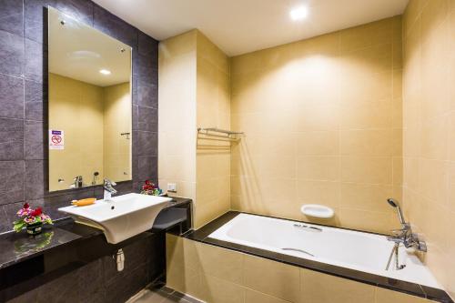 Et badeværelse på Apasari Krabi - SHA Extra Plus