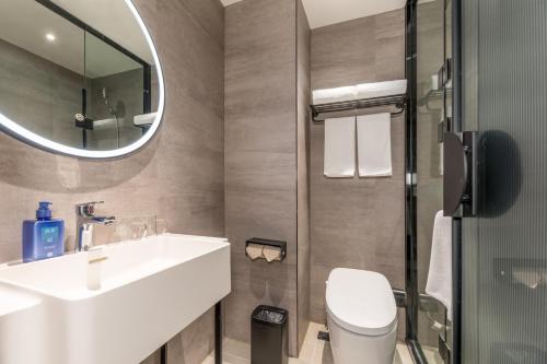 Koupelna v ubytování Hanting Hotel Nanjing Jiangning Jiaotong University Subway Station