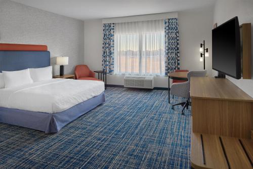 Ένα ή περισσότερα κρεβάτια σε δωμάτιο στο Hampton Inn Vernon