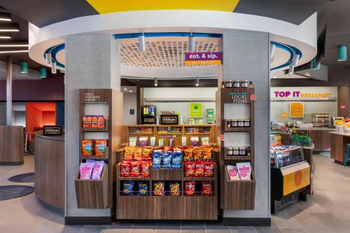 a grocery store aisle with products on display at Tru By Hilton Battle Creek in Battle Creek