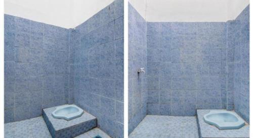 Hotel O Nayla Homestay Syariah Near Koro Koro Panam, Karaoke, Pool, & Cafe في Sultan Syarif Kasim II International Airport: حمام من البلاط الأزرق مع مرحاض ودش