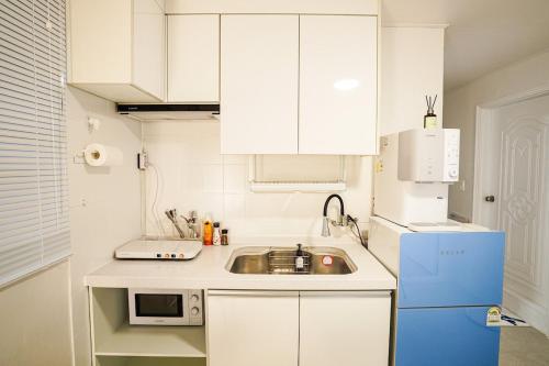 Nhà bếp/bếp nhỏ tại 모던 스테이