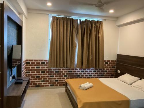 Una cama o camas en una habitación de Hermes apartments by Shore