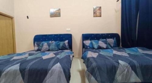 Fotografie z fotogalerie ubytování OYO 90799 Sharhan Residence v destinaci Kampung Telung