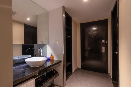 Phòng tắm tại Orange Hotel Suzhou Xiangcheng Avenue Global Harbor