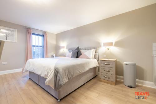 a bedroom with a large bed and a window at Homestead Hillsborough in Hillsborough